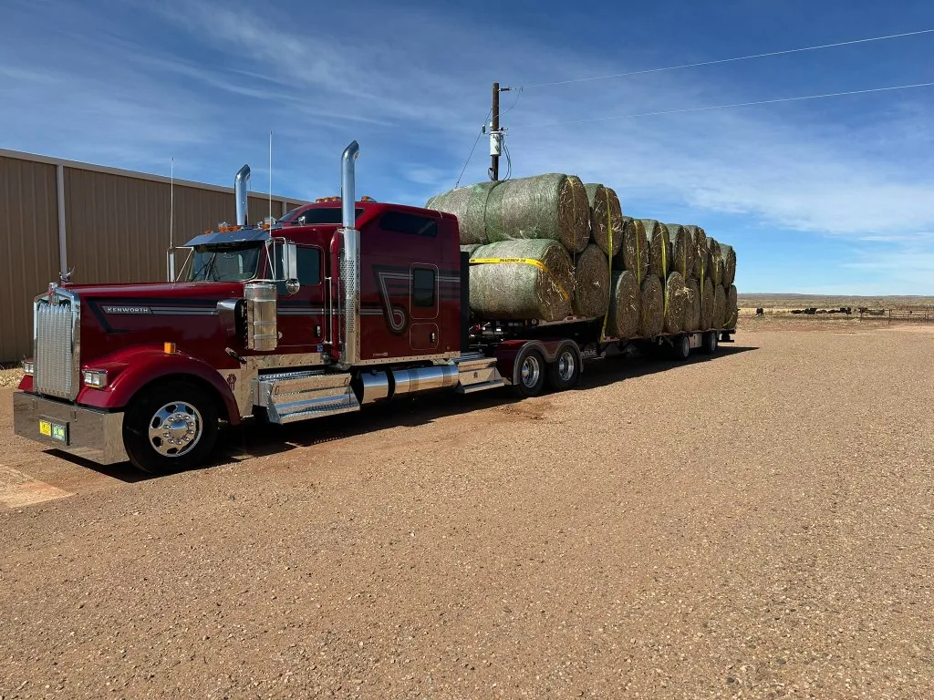 Red Kenworth hauling hay